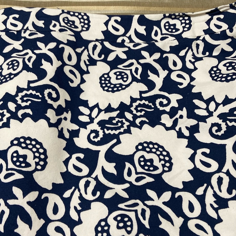 Talbots navy /white side zipper with a bot to crochet lace on both sides.